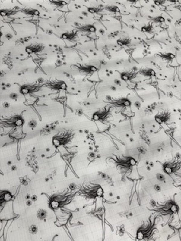 Kresba dívek mezi květinami na textilu.