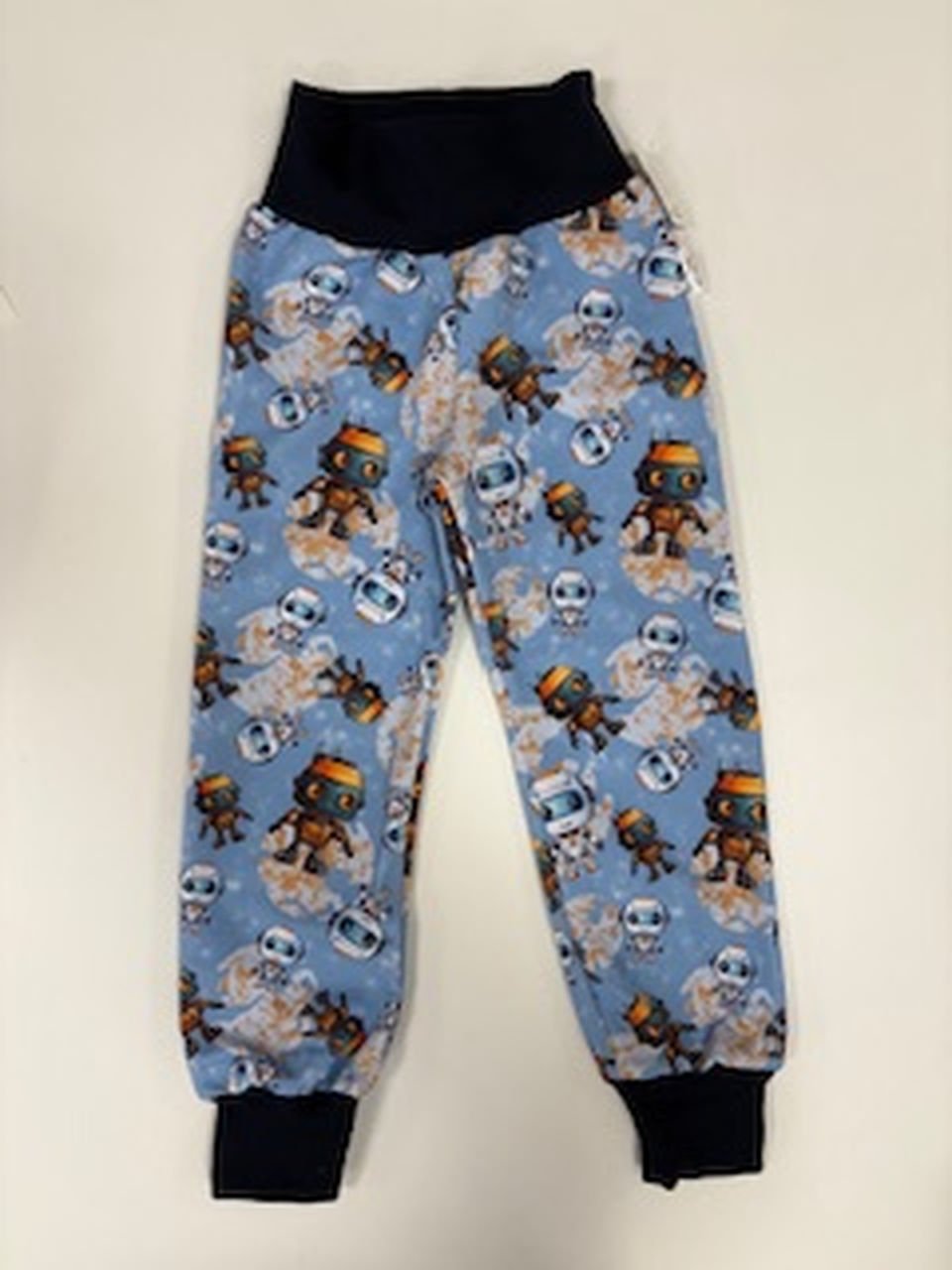 Dětské modré kalhoty s roboty.