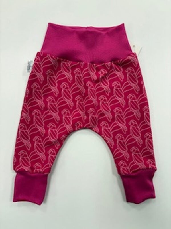 Dětské růžové kalhoty s papoušky