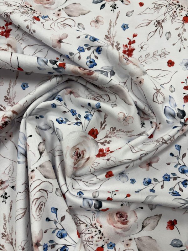 Bavlněná látka s květinovým vzorem modrá a červená.