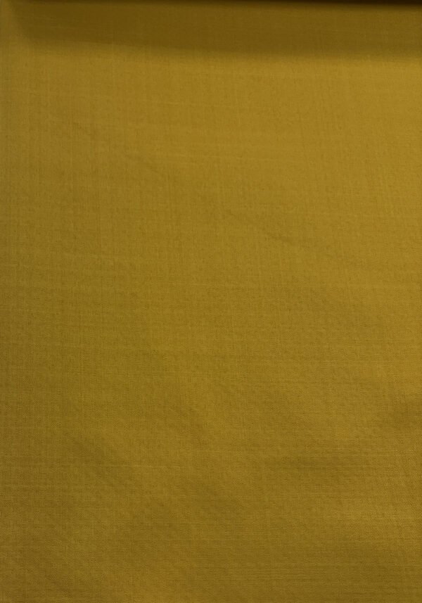 Žlutá textilní látka v detailu