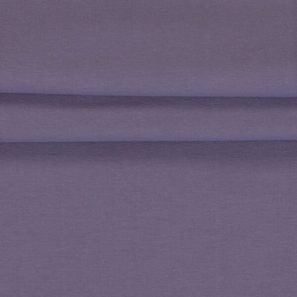 Fialová textilie, jemná struktura látky