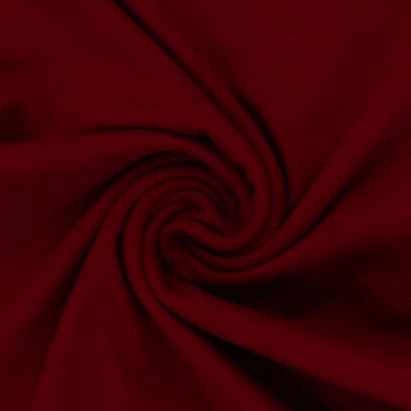 Červená látka stočená ve spirále