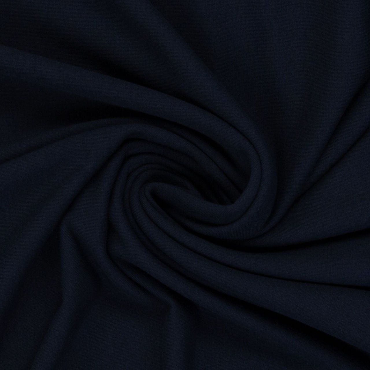 Tmavá stočená tkanina v detailu
