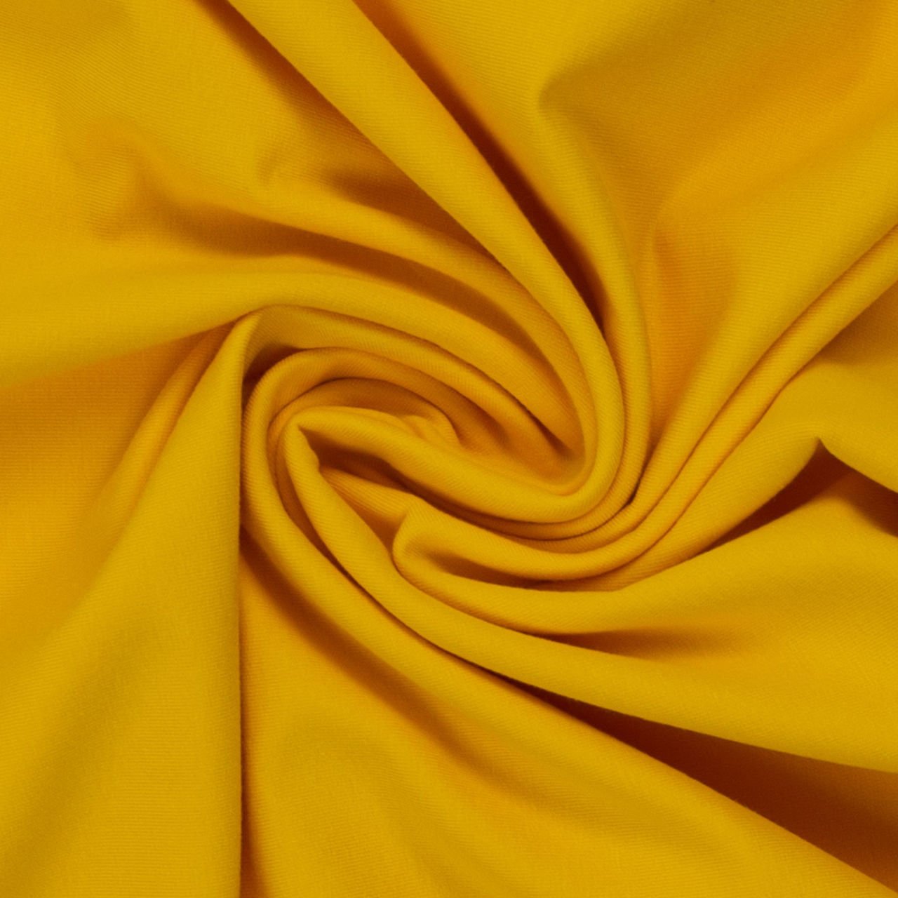 Žlutá látka zkroucená do spirály